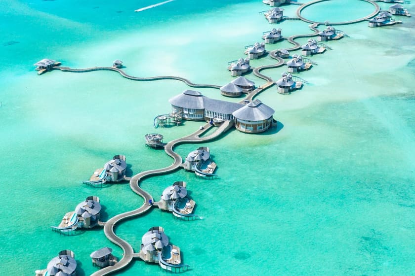 Maldives luxurious overwater villas nestled in a crystal turquoise lagoon